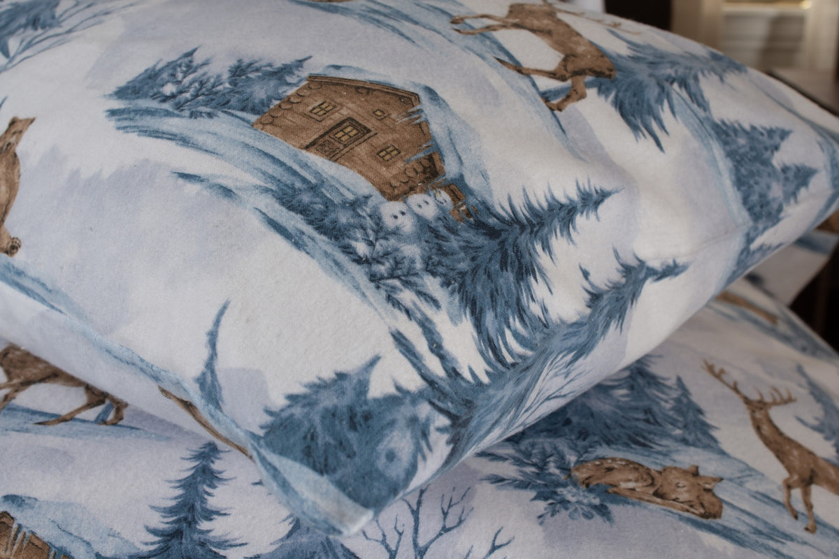 Deyongs Snowy Bear brushed cotton duvet set with a snowy forest scene in blue and white