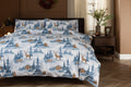 Deyongs Snowy Bear brushed cotton duvet set with a snowy forest scene in blue and white