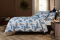 Deyongs Snowy Bear brushed cotton duvet set with a snowy forest scene in blue and white