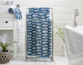 Small Fish cotton towels on a stand — ocean blue jacquard fish design