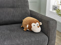 Cozytime Cozy Cuddler Monkey on a sofa