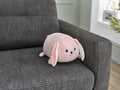 Cozytime Cozy Cuddler Rabbit on a sofa