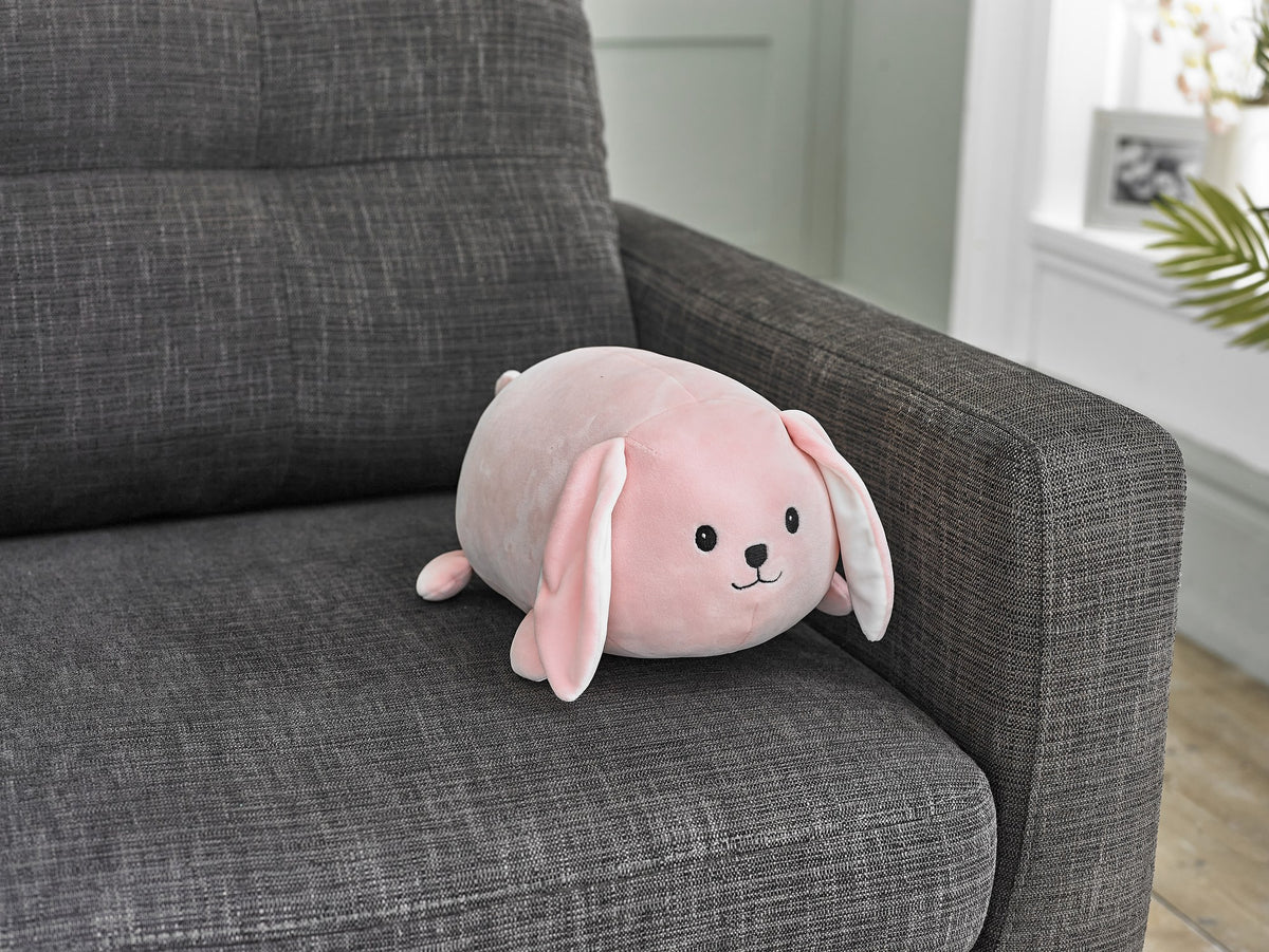 Cozytime Cozy Cuddler Rabbit on a sofa