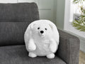 Cozytime Giant Handwarmer Polar Bear on a sofa