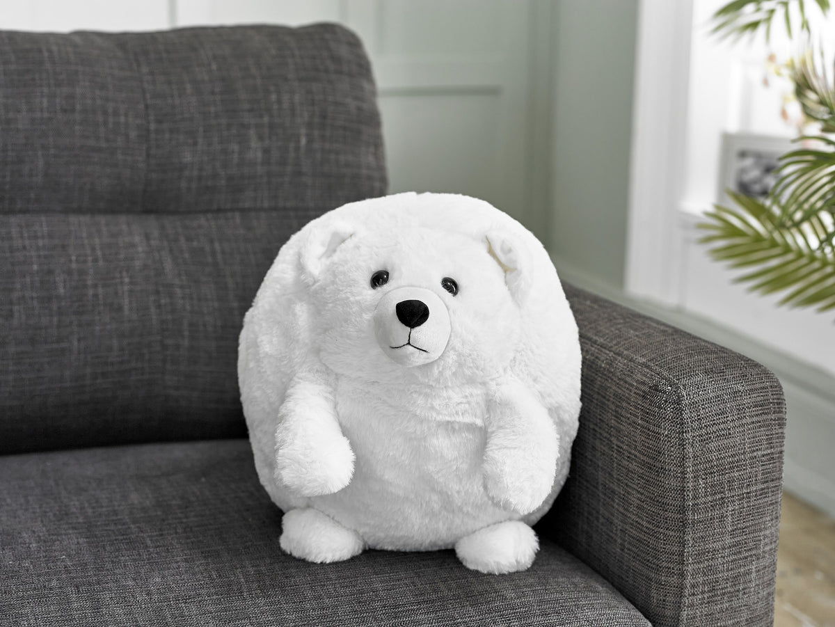 Cozytime Giant Handwarmer Polar Bear on a sofa