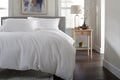 Mottle Textured Duvet Set in White, half bed